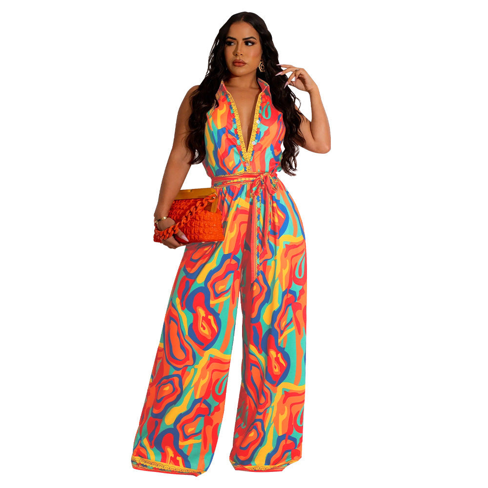 Quella - Vrouwen Wijd Been Abstracte Afdruk Jumpsuit met Strik Stropdas