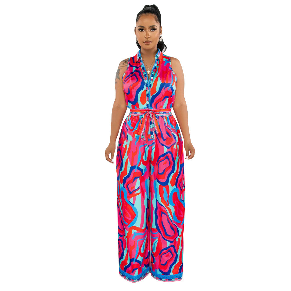 Quella - Vrouwen Wijd Been Abstracte Afdruk Jumpsuit met Strik Stropdas